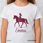 Preview: Design-Beispiel vom Bügelbild Pferd Reiterin Herz auf einem weißen Kinder T shirt